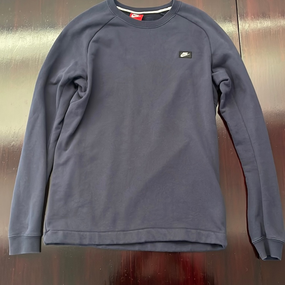 Nike Blue Pullover in Medium with back zipper pocket